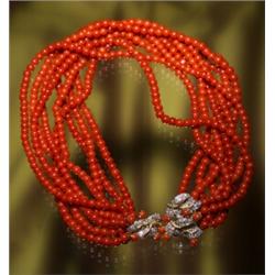 RED CORAL BEAD TORSADE, PLATINUM AND DIAMONDS...