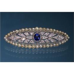 DIAMOND SAPPHIRE PLATINUM BROOCH CIRCA 1915...