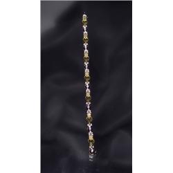 18K TWO TONE DIAMOND BRACELET...