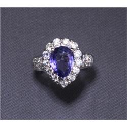 18K TANZANITE DIAMOND RING 4.45 CTS....