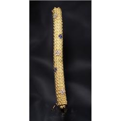 18K SERPENT BRACELET DIAMOND SAPPHIRES...