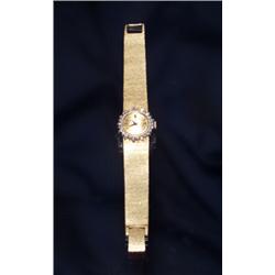 14K DIAMOND WATCH BAUME AND MERCIER...