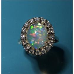 OPAL CABACHON AND DIAMOND RING...