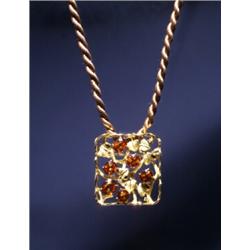 18K ORANGE GARNET DIAMOND BROOCH...