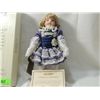 Image 1 : SEYMOUR MANN DOLL PURPLE DRESS