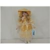 Image 2 : PORCELAIN DOLL IN PEACH DRESS