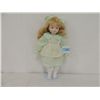 Image 1 : PORCELAIN DOLL IN LIGHT GREEN DRESS WITH STAND