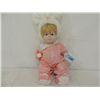 Image 1 : PORCELAIN DOLL IN BUNNY PAJAMAS AND HAT