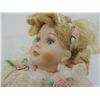 Image 3 : PORCELAIN DOLL ON CAROUSEL HORSE