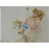 Image 4 : PORCELAIN DOLL ON CAROUSEL HORSE