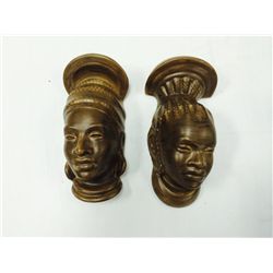 Pair of Denton Ceramic Wall Figures