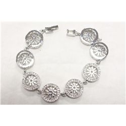 Designer Rhodium Plated Sun Burst Bracelet With Clear Swarovski Crystals