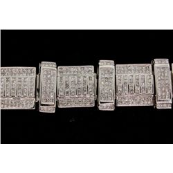 BRACELET: [1] Mens 14kw "invisible" set diamond link bracelet; 784 sq prin dias, 1.6mm x 1.7mm to 1.