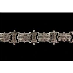 BRACELET: [1] 14kwg (stamped) dia bracelet 9 1/2  long x 12.7mm wide channel and bead set with (318)