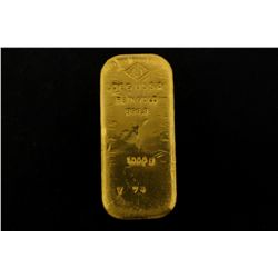 BULLION: [1]  One kilogram Degussa .9999 fine gold bar.