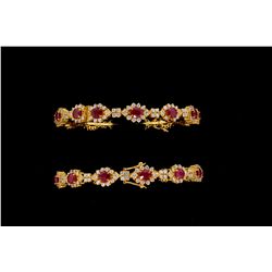 BRACELETS: [2] Sets of ruby and diamond 22kyg bangles. Each has (14) 5.00mm x 4.00mm oval faceted ru