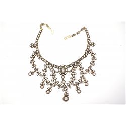 NECKLACE: [1] 14kyg silver topped bib style necklace set with (192) uncut (Polki) dias and (55) rbc 