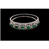 Image 3 : BRACELET: [1] 18kwg emerald and dia bangle prong set with (6) 6.00mm x 4.00mm rectangular emeralds, 