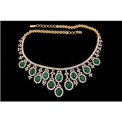 NECKLACE: [1] 18kyg emerald and dia necklace set with (12) oval emerald cabochons commercial to good