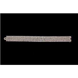 BRACELET: [1] 18kwg diamond flexible link bracelet 7" long x 14.8mm wide, set with (300) rbc dias VS