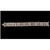 Image 3 : BRACELET: [1] 14kwg and diamond link bracelet, 8 1/4" long x 20.3mm wide, set with (368) invisibly s