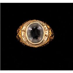 RING:  [1] 18KY & WG ring set with 1 oval faceted synthetic stone, size 10 3/4;  10.5 grams  [stone 