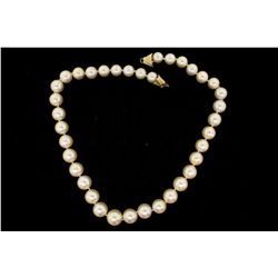PEARLS: [1] Single strand of 10.0 to 14.3mm brownish-light golden color South Sea pearls with a 14KY