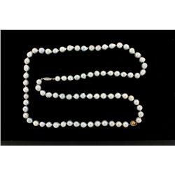 PEARLS: [1] Single strand of 9mm silvery light gray baroque pearls with a 14KWG fishhook clasp; 34''
