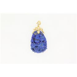 PENDANT: [1] 14KYG pendant with a carved piece of lapis in a dragon motif; 11.3 grams.