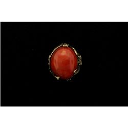 RING: [1] 14KYG ring set with an approx. 19mm x 20mm x 12mm oval Mexican opal with slight crazing, a