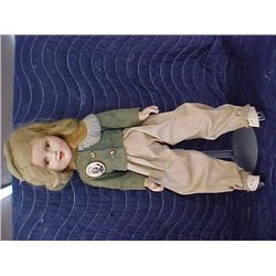 Antique doll on ice skates w/stand