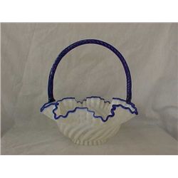 Blue and white glass basket w/fenton handle