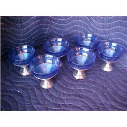 Cobalt blue depression glass with silverplate holders