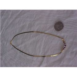 14k Gold necklace with rubies and diamonds