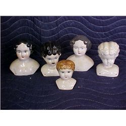 5 pc. 1956 handmade ceramic doll heads