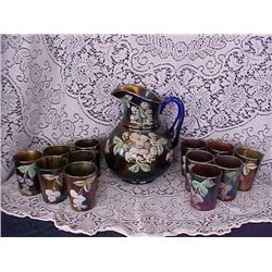 Carnival glass hand painted pitcher and 12 glasses