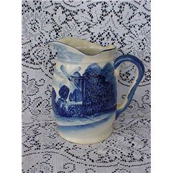Hand painted blue and white pitcher