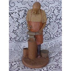 Tom Clark "Blacksmith" 1987 crushed walnut figurine