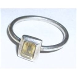 STERLING SILVER RING WITH A CITRINE EMERALD CUT GEMSTONE!! RING CAME OUT OF SAFE!!