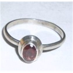 STERLING SILVER RING WITH A RED GARNET OVAL CUT GEMSTONE STAMPED *925*!! RING CAME OUT OF SAFE!