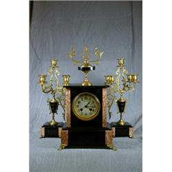 A French 8 Day Clock Garniture with Enamel Dial E.Cousin the Case in Black and Pink Veined Marble...