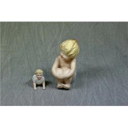 A Heubach Bisque Baby Figure with Bathing Cap Est. 200-300...