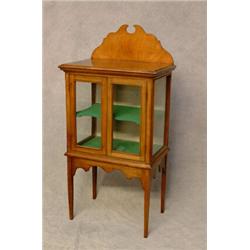 An Edwardian Mahogany Display Cabinet with Moulded Top having Shaped Gallery Back. Glazed Doors t...