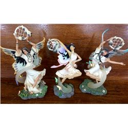 Three Native ladies statues