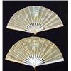Image 1 : Two mother-of-pearl fans, hand painted with flowers and panels of lovers…