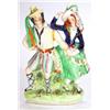 Image 1 : Hand painted Victorian Staffordshire figure group depicting a man and young woman dancing, 27cm h…