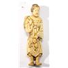 Image 1 : Carved ivory Netsuke modelled as a lady carrying shells in a bag, 9cm high…