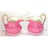 Image 1 : Pair of Victorian pink glazed floral moulded jugs with gilt decoration, 13cm high…