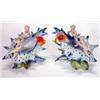 Image 1 : Pair of hand painted Continental porcelain shell shaped vases with cherub decoration, 18cm high…