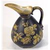 Image 1 : Victorian pottery jug, hand enamelled with gilt flowers and a bird onto a black ground, 18cm high…